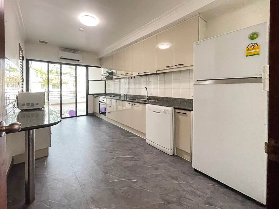 Pet-friendly 3 bed, 3 bath apartment for rent in Thong Lor. 280 sqm with balcony, maid room, full facilities, and greenery views. 120,000 THB/month.