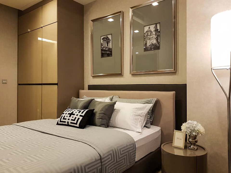 Luxury high-floor 2-bedroom condo for rent at The ESSE Asoke. Fully furnished with skyline views, top facilities, and prime Asoke location. Rent 70,000 THB/month.
