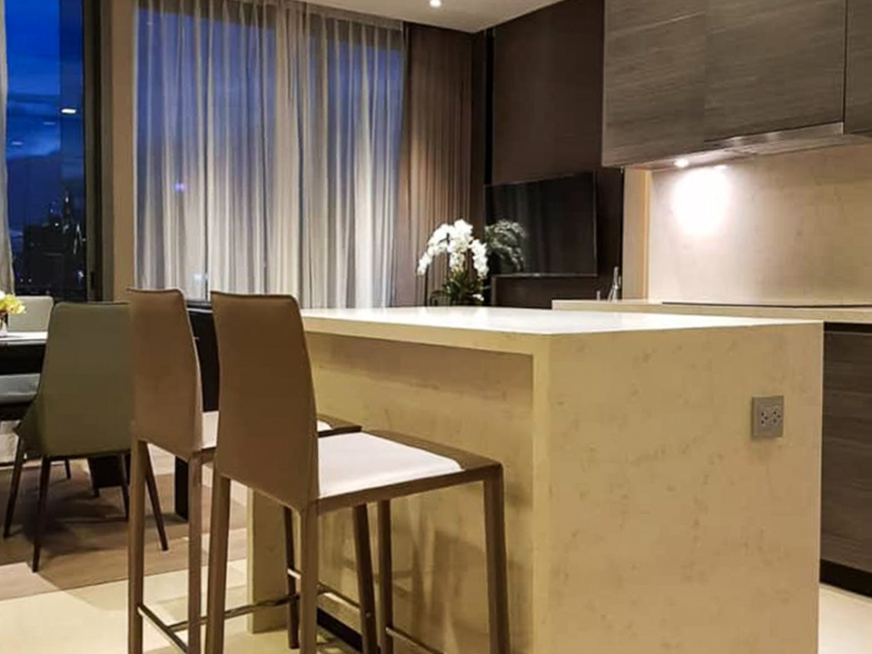 Luxury high-floor 2-bedroom condo for rent at The ESSE Asoke. Fully furnished with skyline views, top facilities, and prime Asoke location. Rent 70,000 THB/month.