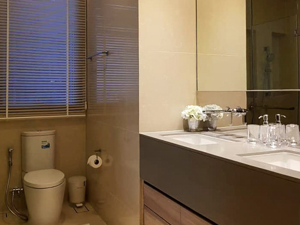 Luxury high-floor 2-bedroom condo for rent at The ESSE Asoke. Fully furnished with skyline views, top facilities, and prime Asoke location. Rent 70,000 THB/month.