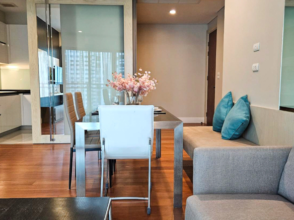 Spacious and newly renovated 1-bedroom corner condo for rent at Bright Sukhumvit 24, 70 sqm, fully furnished, with EV charger and luxury facilities.