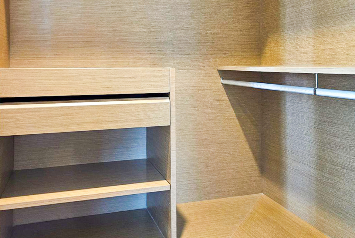 Spacious and newly renovated 1-bedroom corner condo for rent at Bright Sukhumvit 24, 70 sqm, fully furnished, with EV charger and luxury facilities.